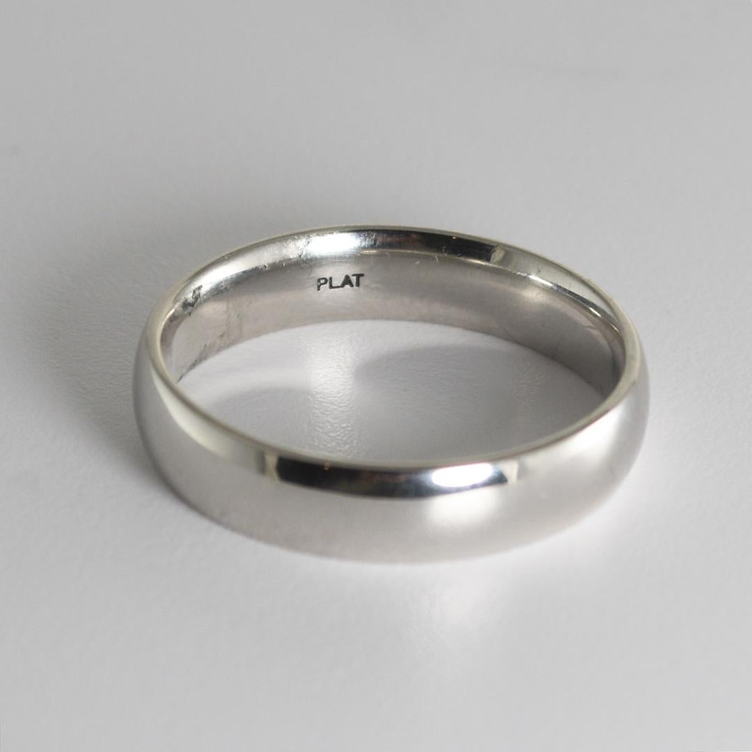 This handsome, band-style platinum ring weighs 10 grams.
It measures 5mm in width and is a size 9.75.
The ring has been repaired to be in a condition just like new and it was cleaned and re-polished.