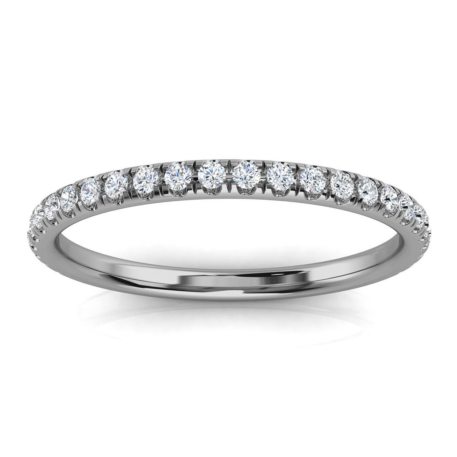 This Delicate ring band features Twenty Six (26) Brilliant round diamonds Micro-Prongs set on a 1.5 mm band. It's the perfect matching band to Monro Cushion Halo in our engagement ring syle section. Experience the difference in person!

Product
