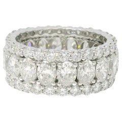 Platinum Natural 6.86 Carat Oval Cut & Round Brilliant Cut Diamond 3-Row Ring