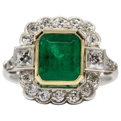 Platinum Natural Colombian Emerald and Antique Diamonds Ring