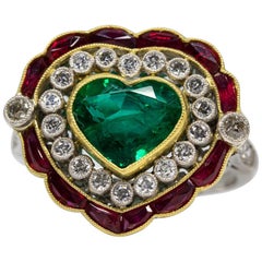 Vintage Platinum Natural Emerald Old Mine Cut Diamonds and Rubies Ring