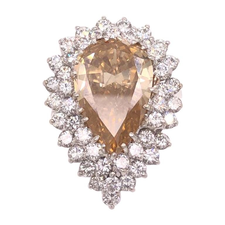 Double Halo Fancy Natural Yellow Brownish Pear Shape Platinum Diamond Ring For Sale
