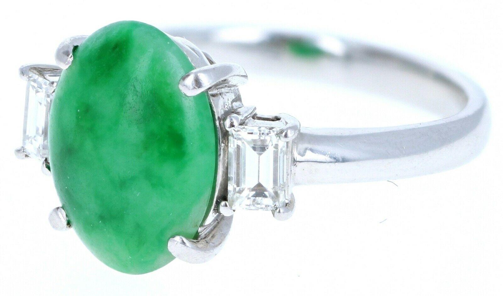 Beautiful jade & diamond ring 

Very elegant for everyday wear !! A jade!

Approx 0.45ctw of g-h vs diamonds 

Jade size approx ct 3.16



No treatment 100% NATuRAL  

Size 8 3/4

Weight 6.7 grams