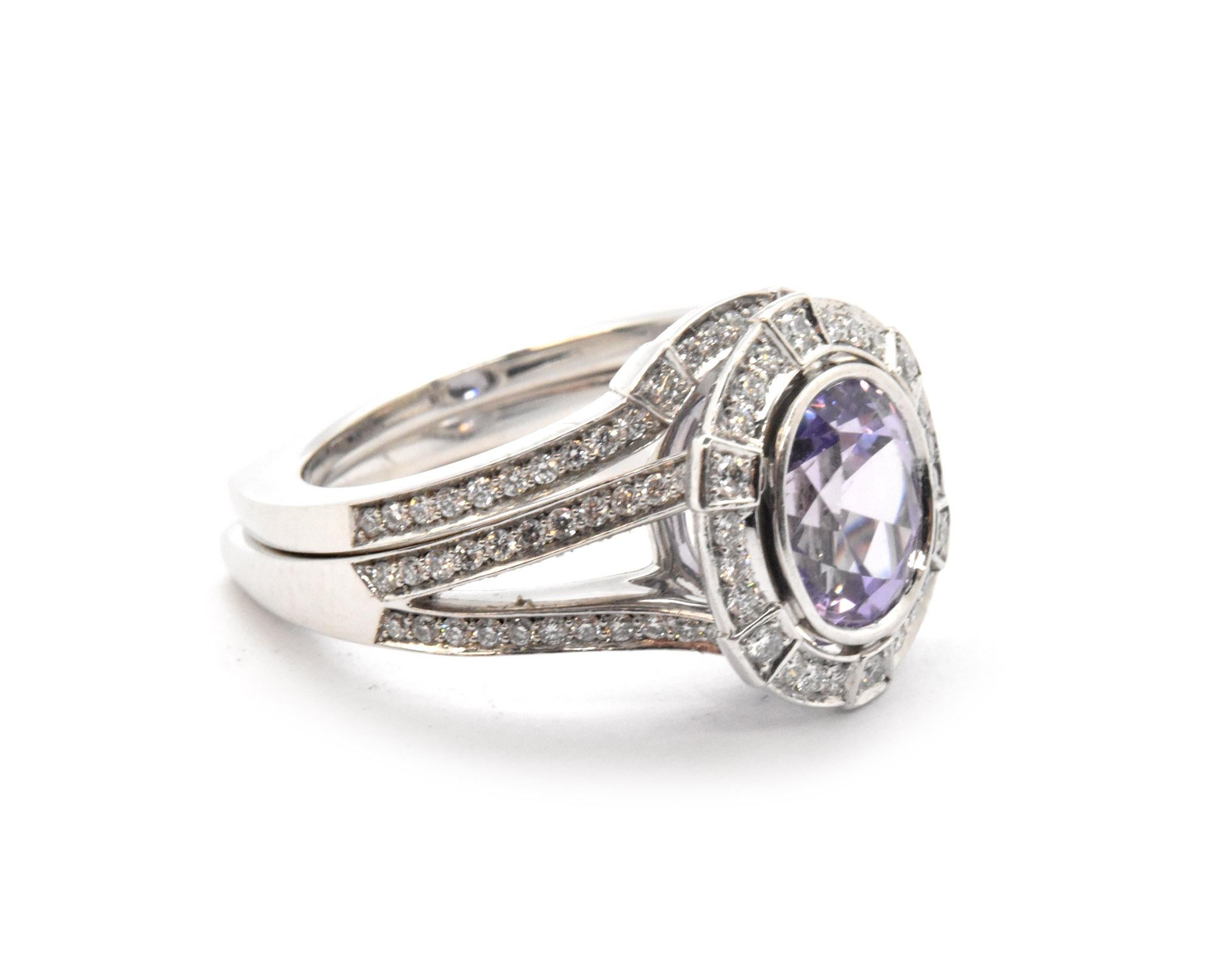 This set features a lovely engagement ring set with a truly impressive oval purple 2.29ct all natural sapphire surrounded by a halo of diamonds. All natural purple sapphires are scarce and are perfect to show someone important just how special they