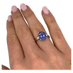 Platinum Natural Tanzanite 3.26ct Ring Set With 2 Natural Diamonds