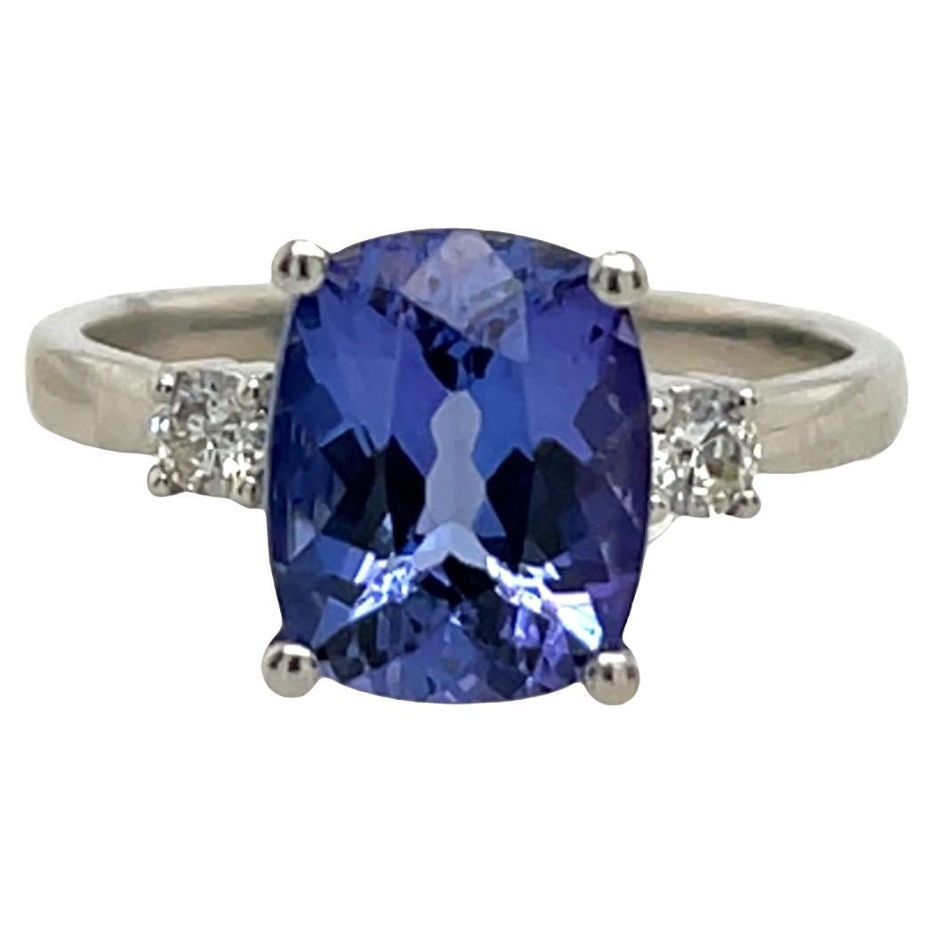 Platinum Natural Tanzanite 3.26ct Ring Set With 2 Natural Diamonds