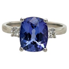 Platinum Natural Tanzanite 3.26ct Ring Set With 2 Natural Diamonds