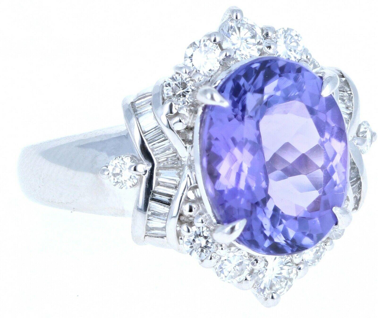 Platinum, Tanzanite & Diamond Ring 5.63ctw 10g



 Beautiful tanzanite & diamond ring 

Very elegant for everyday wear !! 

Approx 0.80ctw of G-H, VS diamonds 

Tanzanite approx 4.83 ct



Size 6.5

Weight: 10 grams

