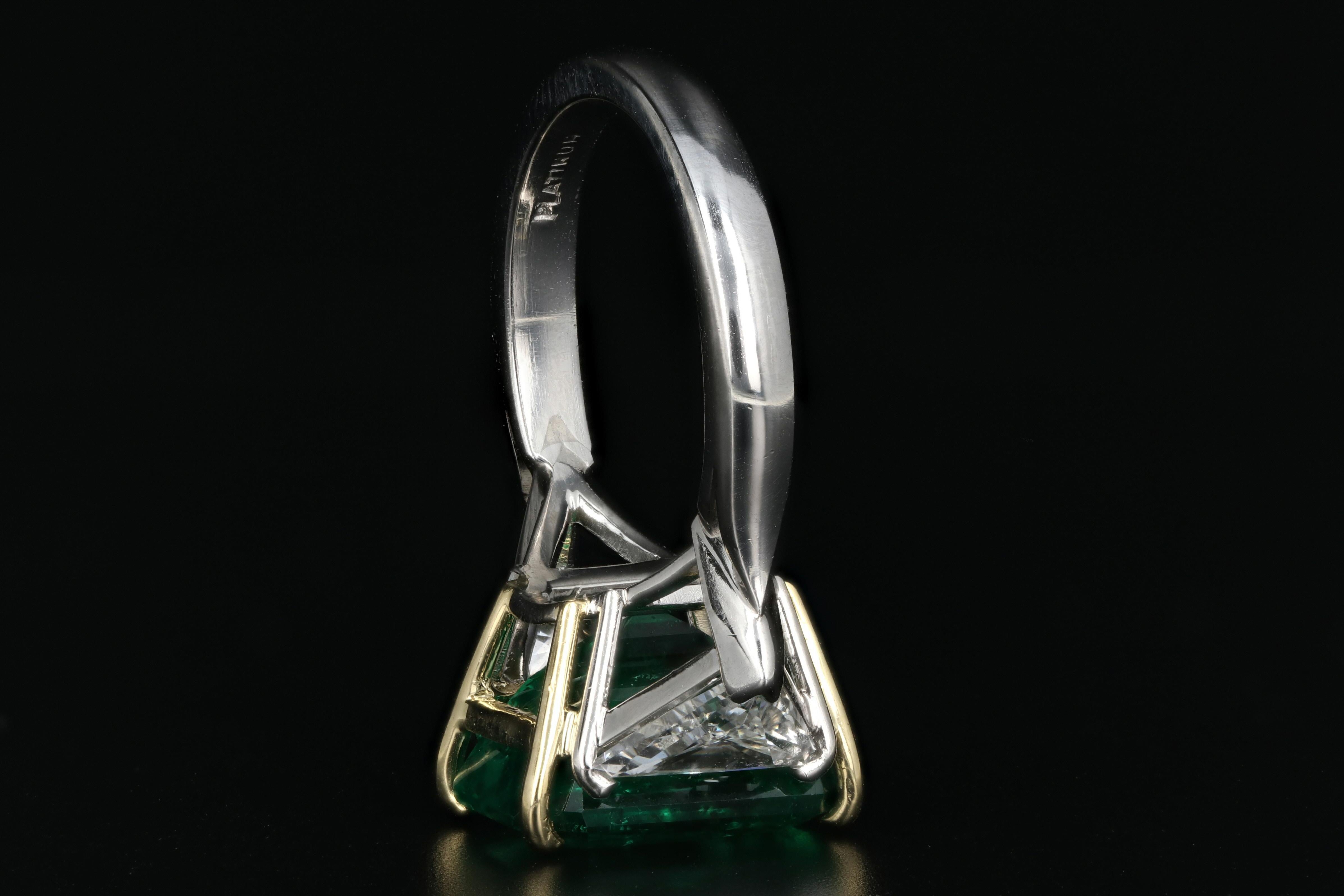 Women's Platinum Natural Zambian Emerald Ring with Trillion Cut Diamonds
