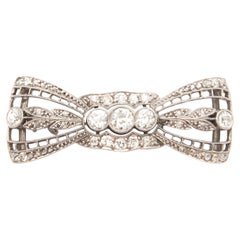 Spilla a fiocco in platino con diamanti Art Deco 1930