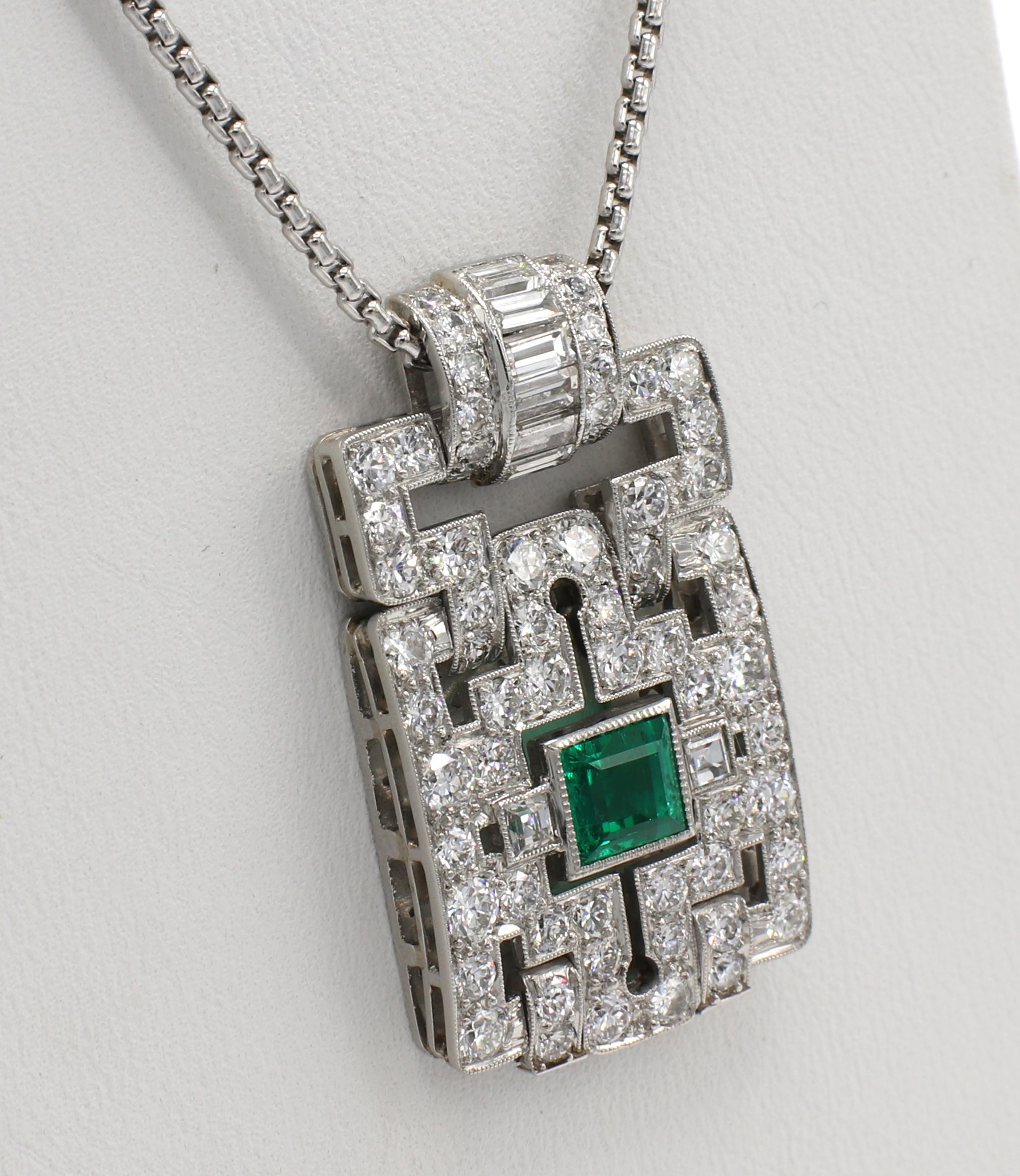Platinum Old European Cut Diamond & Emerald Art Deco Pendant Necklace 
Metal: Platinum & 18k white gold
Weight: 19.14 grams
Diamonds: Approx. 3 CTW G VS European cut round, baguette, & square diamonds G-H VS
Emerald: Approx. .80 carat
Pendant: 33 x