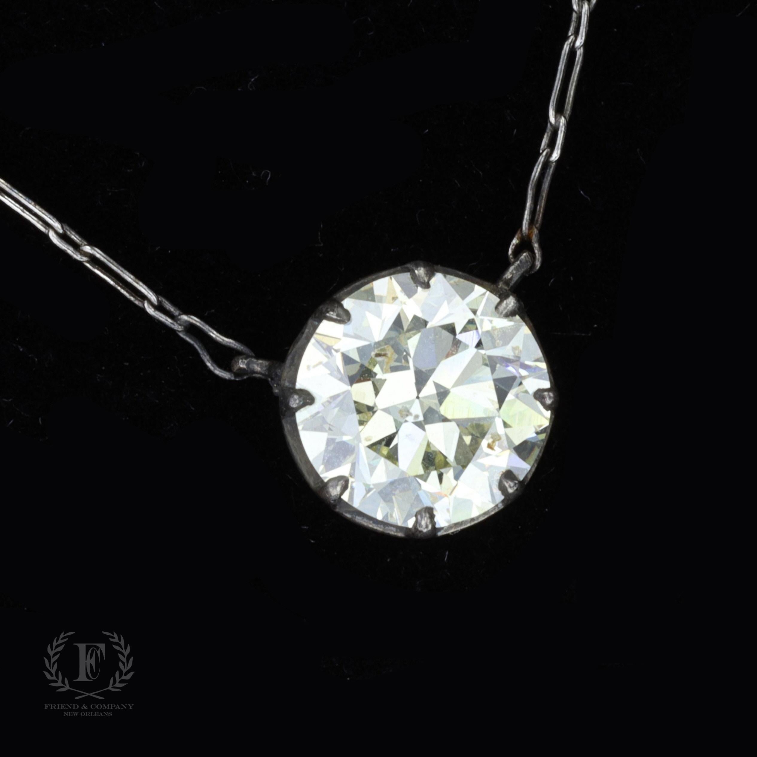 This necklace is a piece to cherish for a lifetime. This bezel set diamond pendant contains one Old European diamond with a total weight of 3.40 carats. The pendant is set on a platinum chain that measures 18 inches in length.