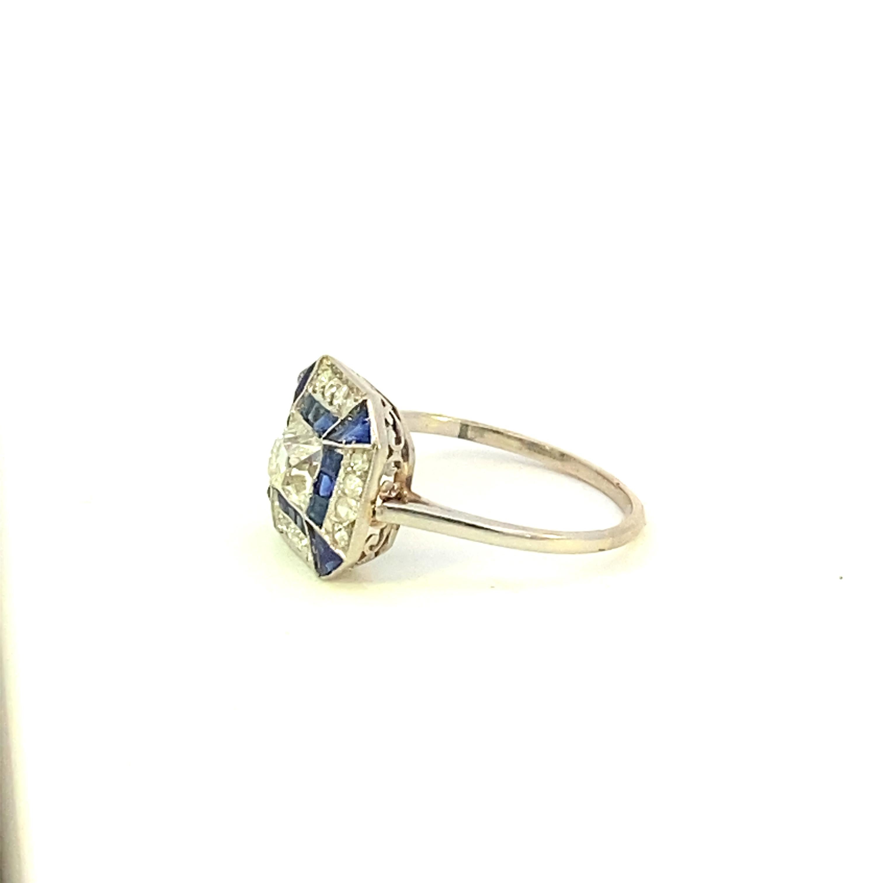 Platinum one 0.50 carat Old Mine Cut center diamond and 0.35 carat total weight sapphires, and 0.40 carat total weight accent diamonds. Size 8.25 US