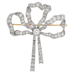 Platinum on 14 Karat Yellow Gold Antique Diamond Bow Pin