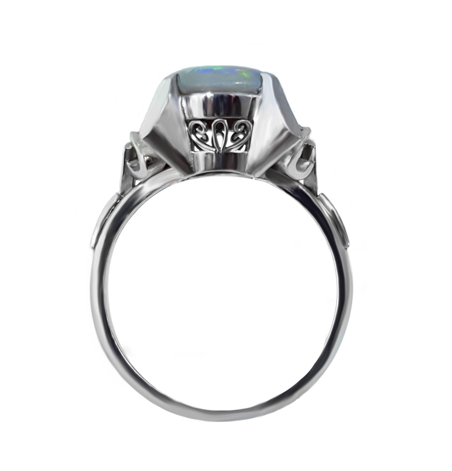 Modern Platinum Opal and Diamond Ring