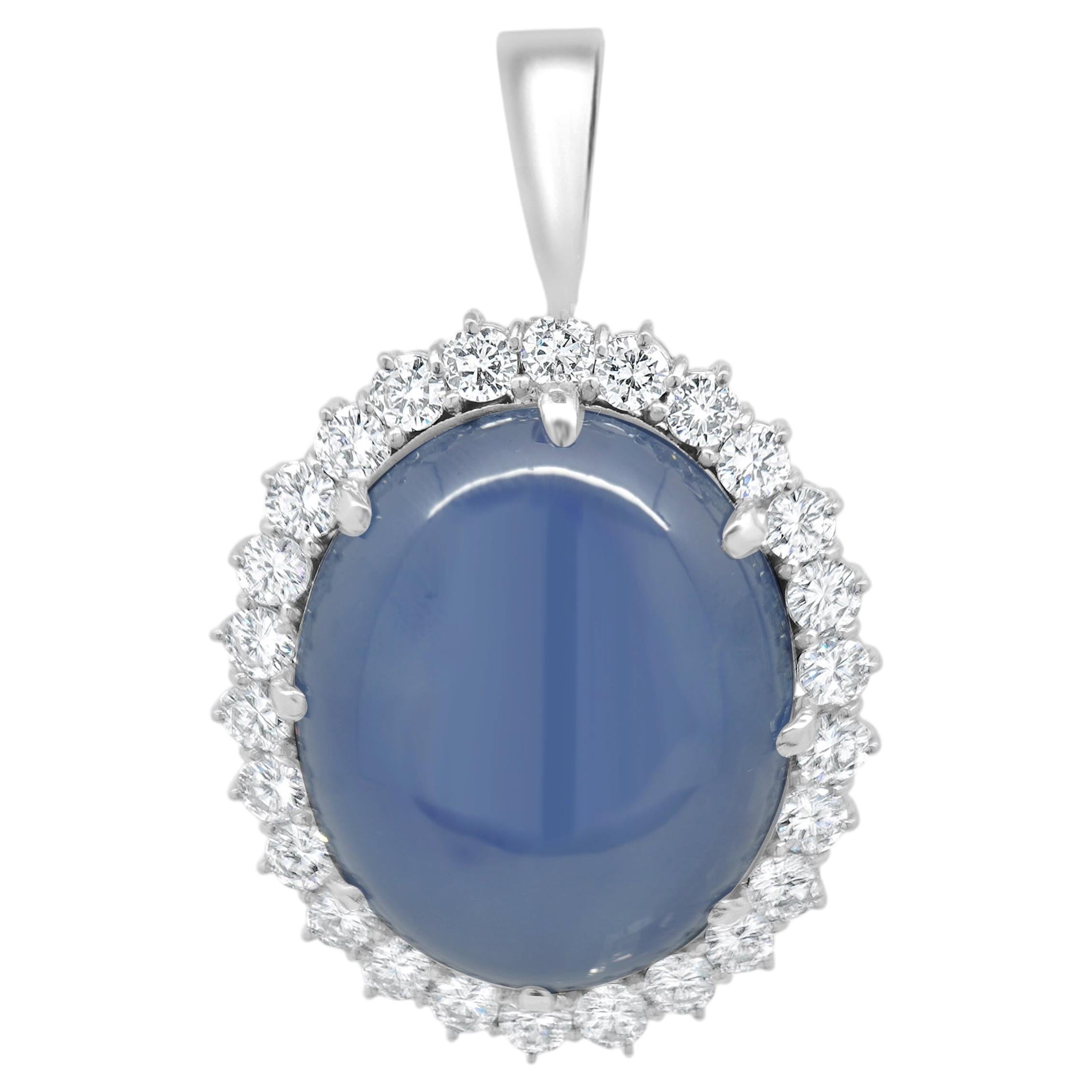 Platinum Oval Cabochon Cut Blue Star Sapphire and Round Diamond Halo Pendant