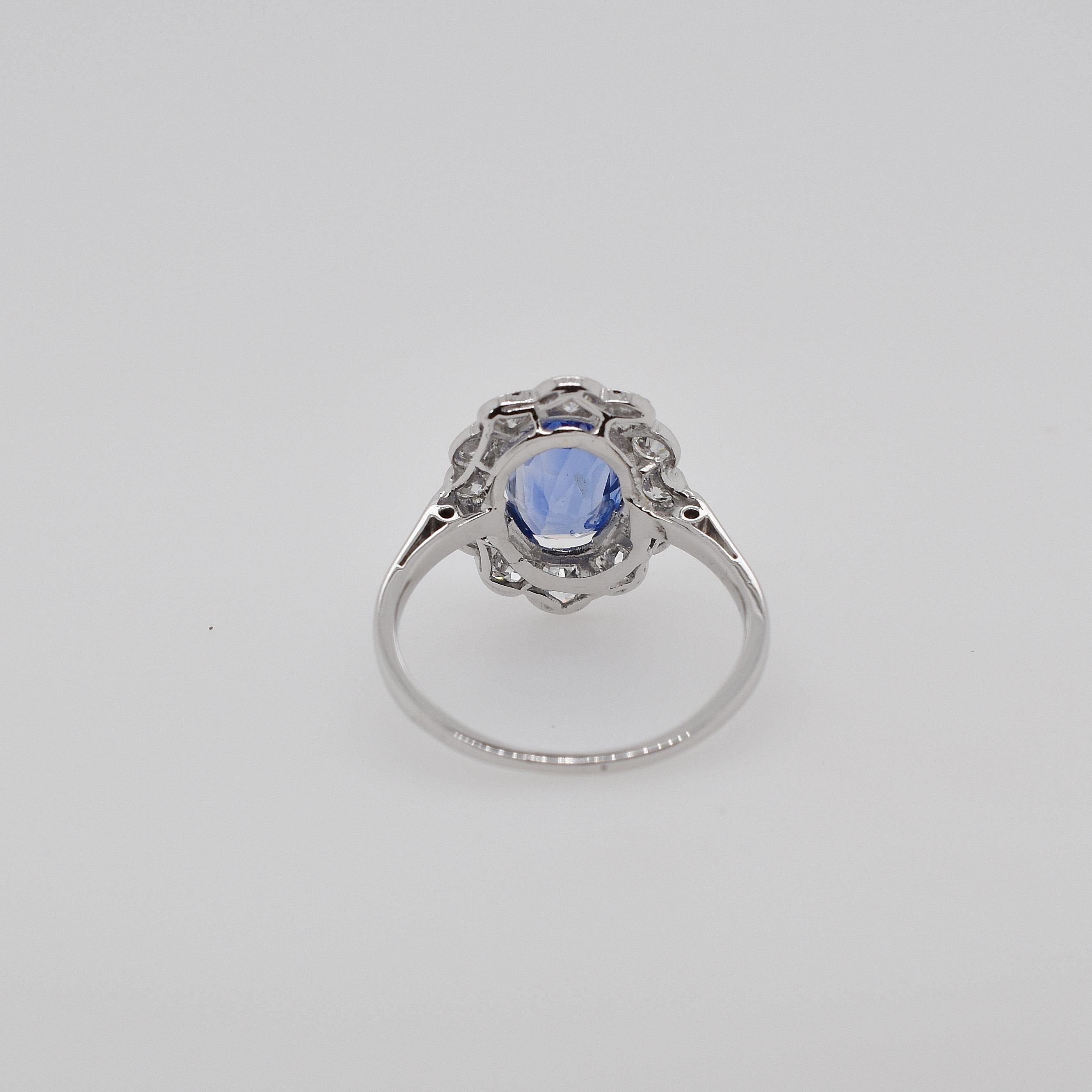 Art Deco Platinum Oval Ceylon Sapphire and Semi Modern Cut Diamond Scalloped Cluster Ring