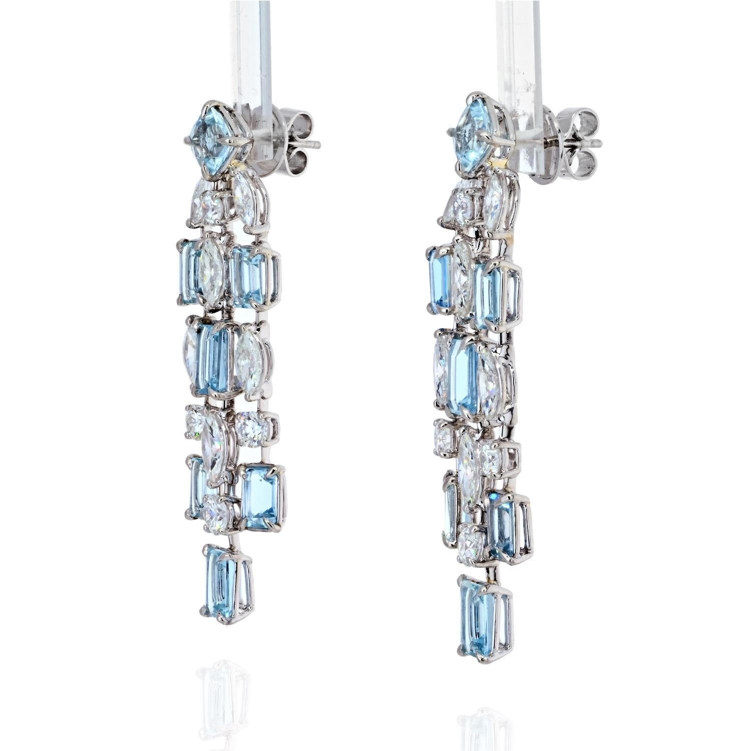 Make a statement with an unforgettable jewelry piece like our triple drop chandelier aquamarine and diamond earrings. Comprising alternating oval shaped aquamarines and brilliant cut diamonds, in platinum. Add a pop of color and glamour to any look.