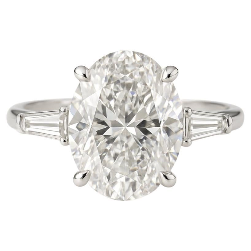 Platinum Oval Cut Diamond Ring 4ct with Tapered Baguette Side Stones