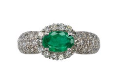 Platinum Oval Emerald and Multi-Row Pavé Diamond Halo Ring