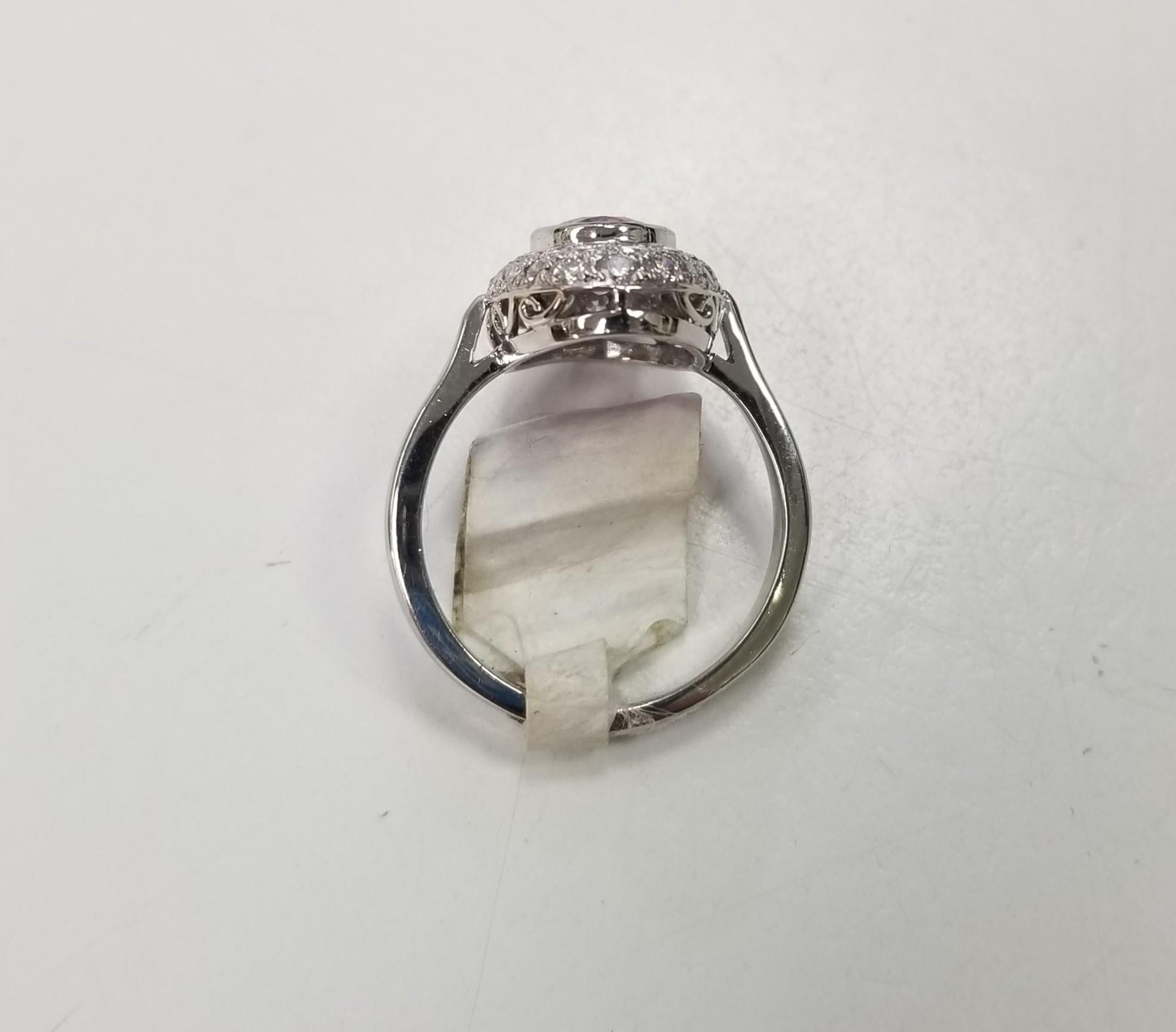 Oval Cut Platinum Oval Pink Sapphire and Diamond Pave' Ring For Sale