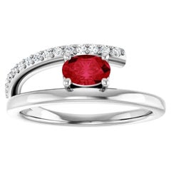 Platinum Oval Ruby and Accented Diamond Bypass Ring