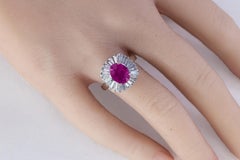 Platinum Oval Ruby and Tapered Baguette Ballerina Cluster Ring