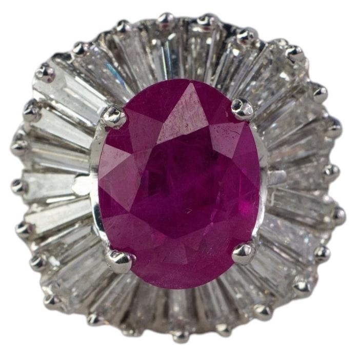 Platinum Oval Ruby and Tapered Baguette Ballerina Cluster Ring For Sale