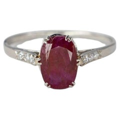 Platinum Oval Ruby Solitaire Ring with Diamond Accents