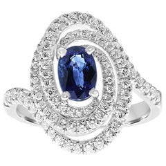 Platinum 'PT950' Oval Shape Swirl Ring with Blue Sapphires and Diamonds