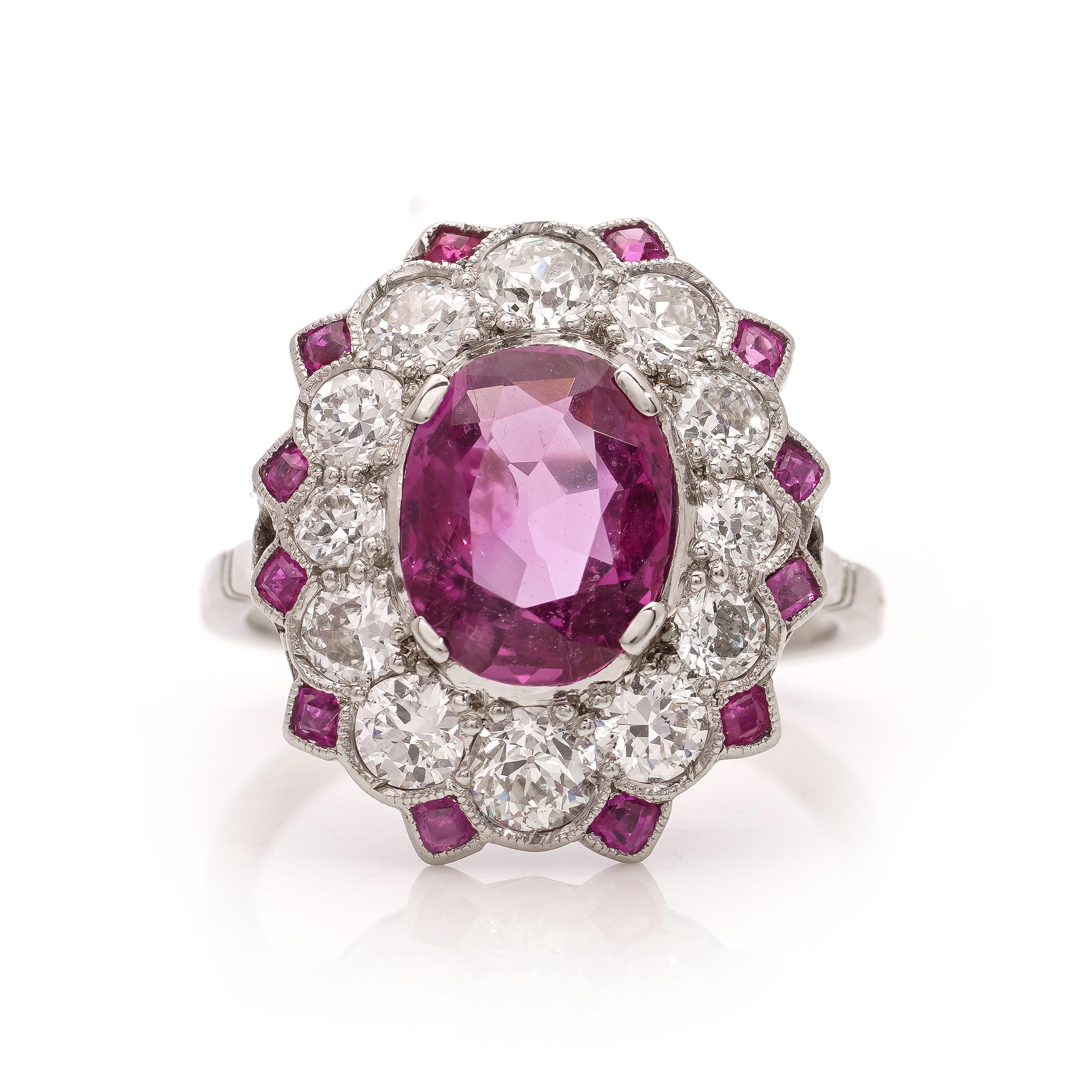 Platinum oval-shaped 2.25 cts. Natural Burma ruby cluster ring  In Good Condition For Sale In Braintree, GB