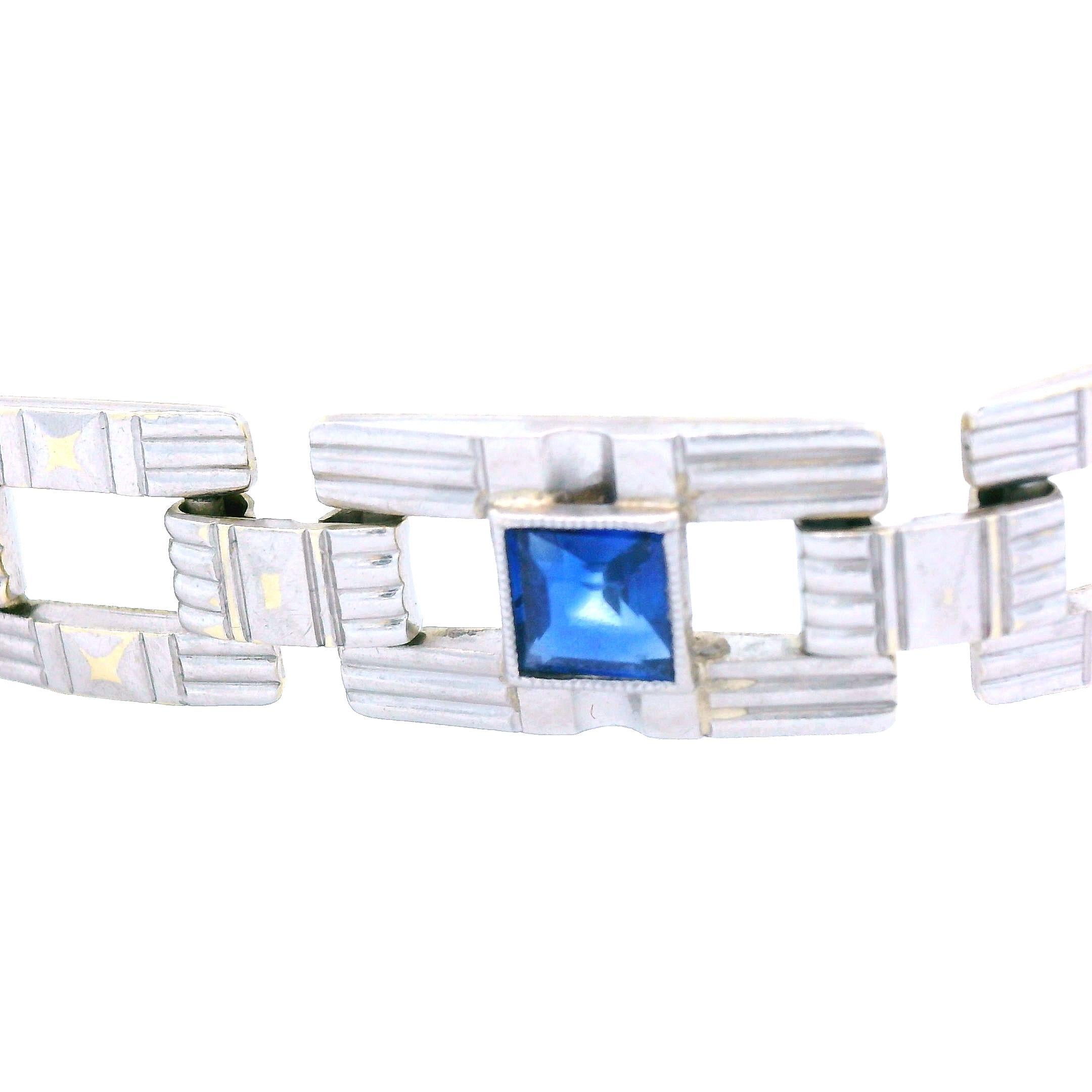 This Art Deco bracelet comes from 1915 and is made in 14k yellow gold and platinum. The entire bracelet is made in 14k yellow gold, which can be seen on the inside of the bracelet, while the outside is platinum over the 14k yellow gold. The two tone