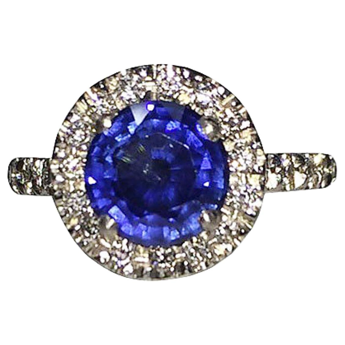 Platinum Pavé Diamond and Blue Sapphire Ring For Sale
