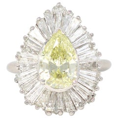 Platinum Pear and Baguette Diamond Ballerina Ring with Yellow Diamond Center