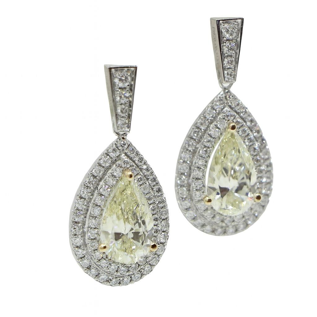 Taglio a goccia Orecchini a goccia in platino con pera e diamante rotondo in vendita