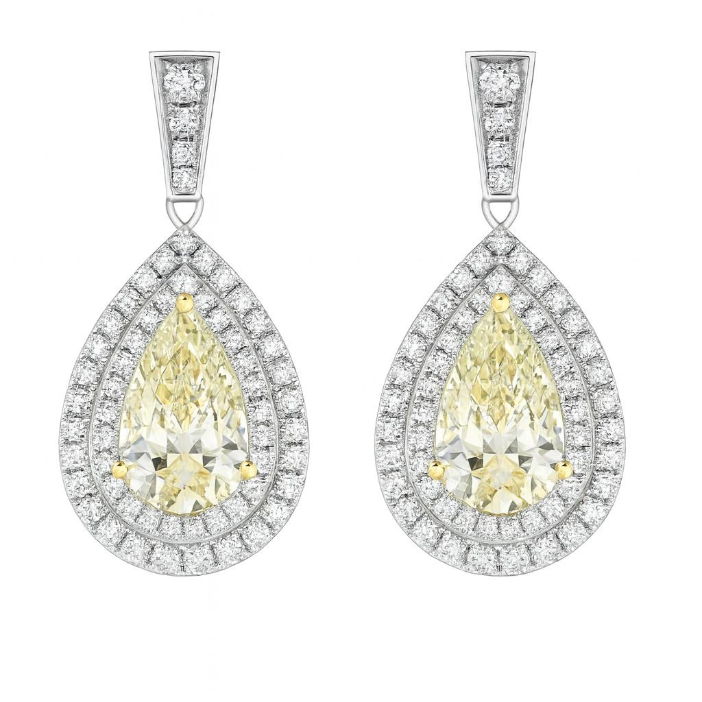 Orecchini a goccia in platino con pera e diamante rotondo In condizioni Nuovo in vendita a Chicago, IL