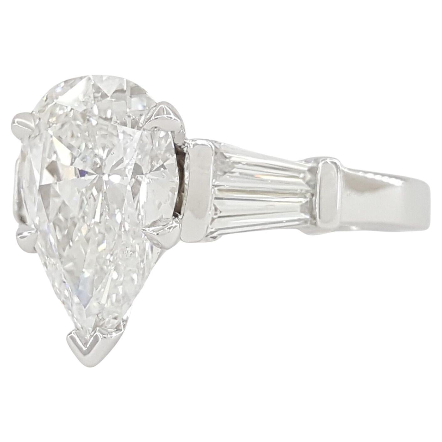 Modern Platinum Pear Brilliant Shaped & Tapered Baguette Cut Diamond Engagement Ring For Sale