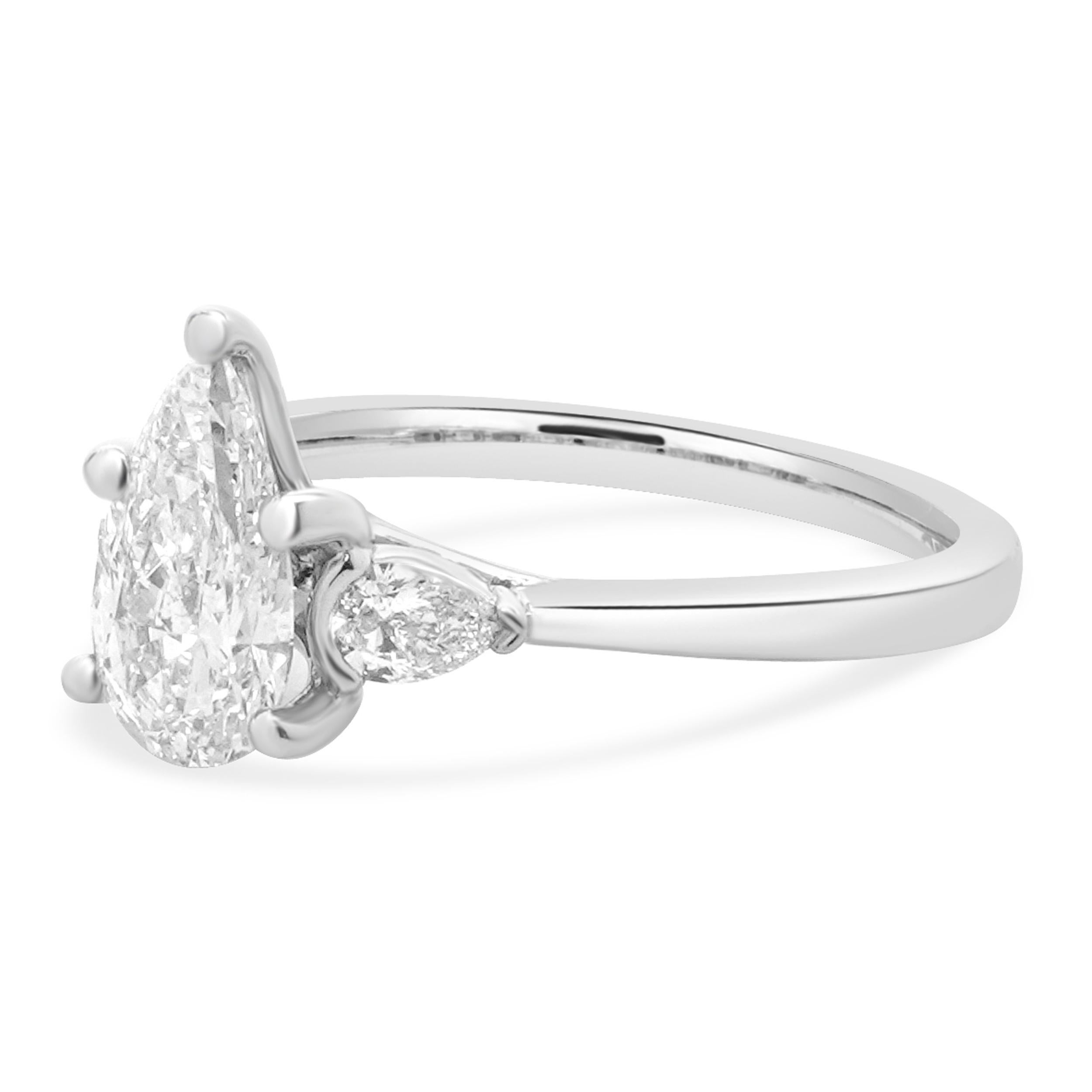Material: platinum
Center Diamond: 1 pear cut = 1.00ct
Color: H
Clarity: VS1
GIA: 6485206358
Diamond: 2 pear cut = 0.24cttw
Color: H
Clarity: VS2
Ring Size: 6.75 (please allow up to 2 additional business days for sizing requests)
Dimensions: ring