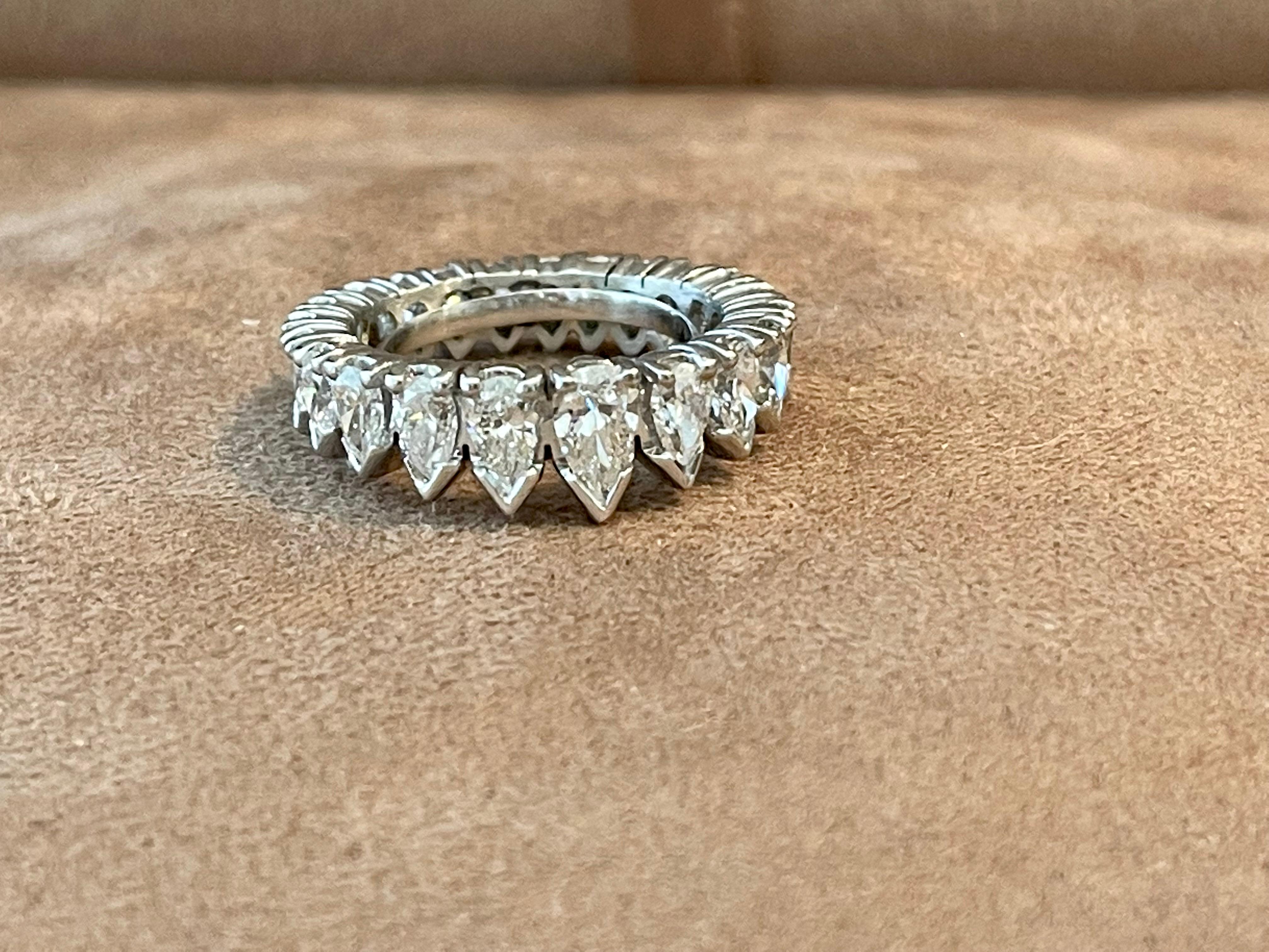 This timeless Platinum eternity band features 24 pear shape Diamonds weighing approximately 4.20 ct, H color, si clarity.
The ring is currently size 52/12( american Ring size 6) but can be resized from a professional goldsmith easily. 
QUESTIONS? 