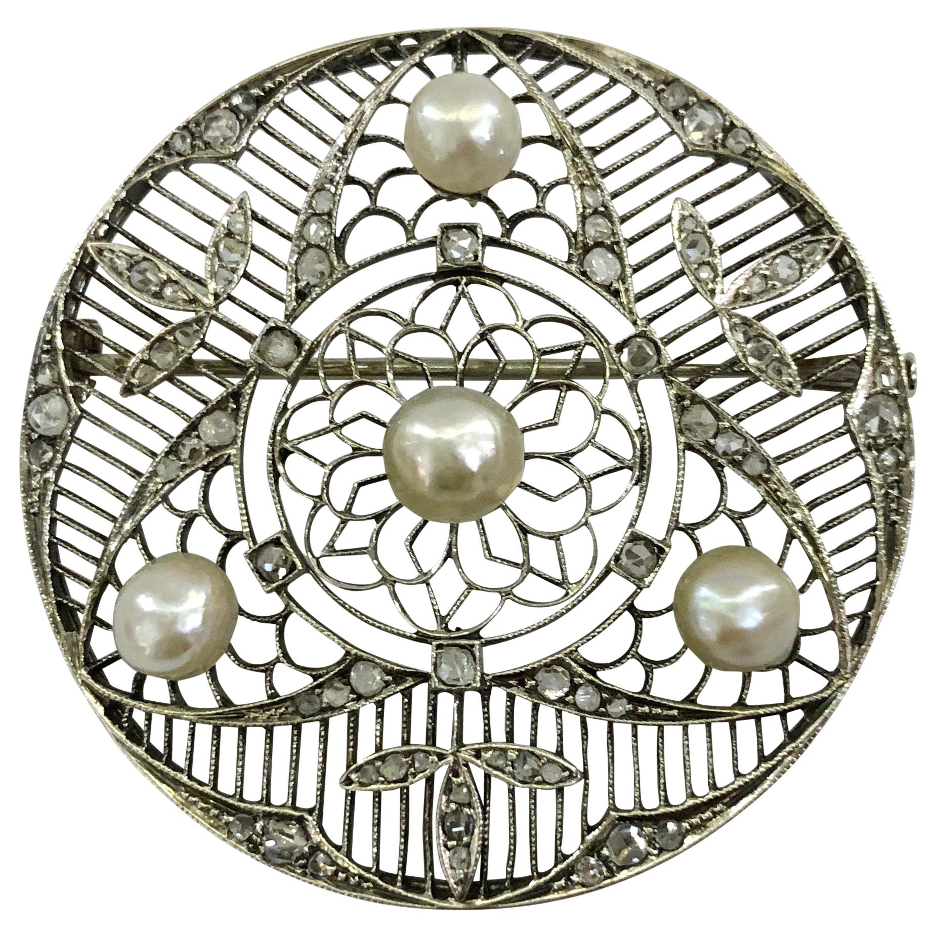 Broche en platine, perles et diamants