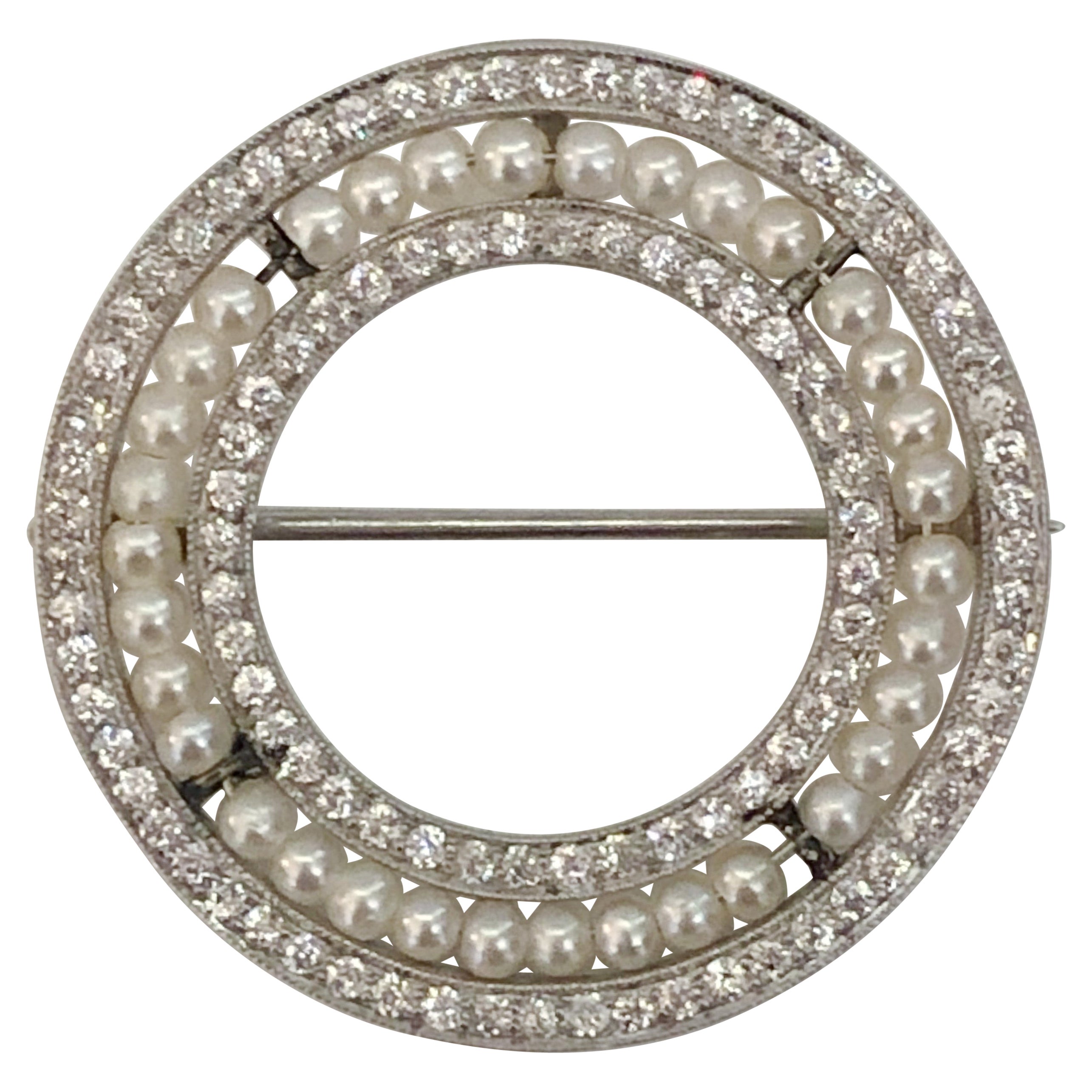 Spilla di platino con perle e diamanti