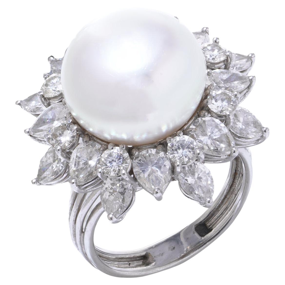 Anello con perle e diamanti in platino