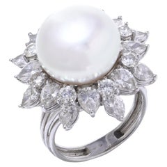 Bague en platine avec perles et diamants