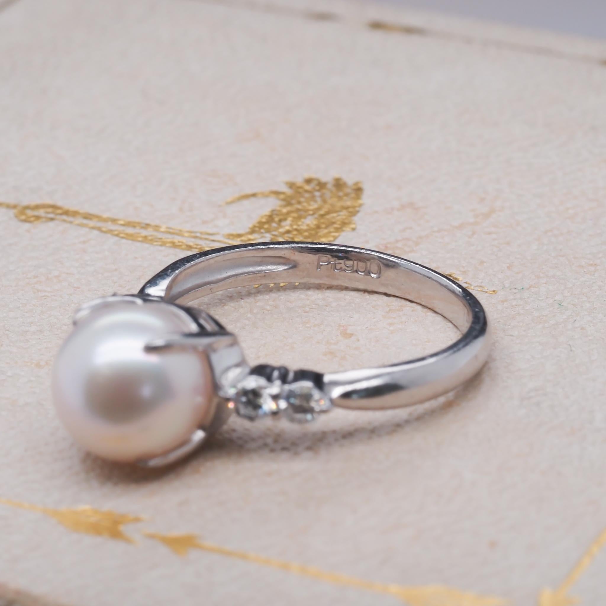 Contemporary Platinum Pearl and Diamond Engagement Ring For Sale