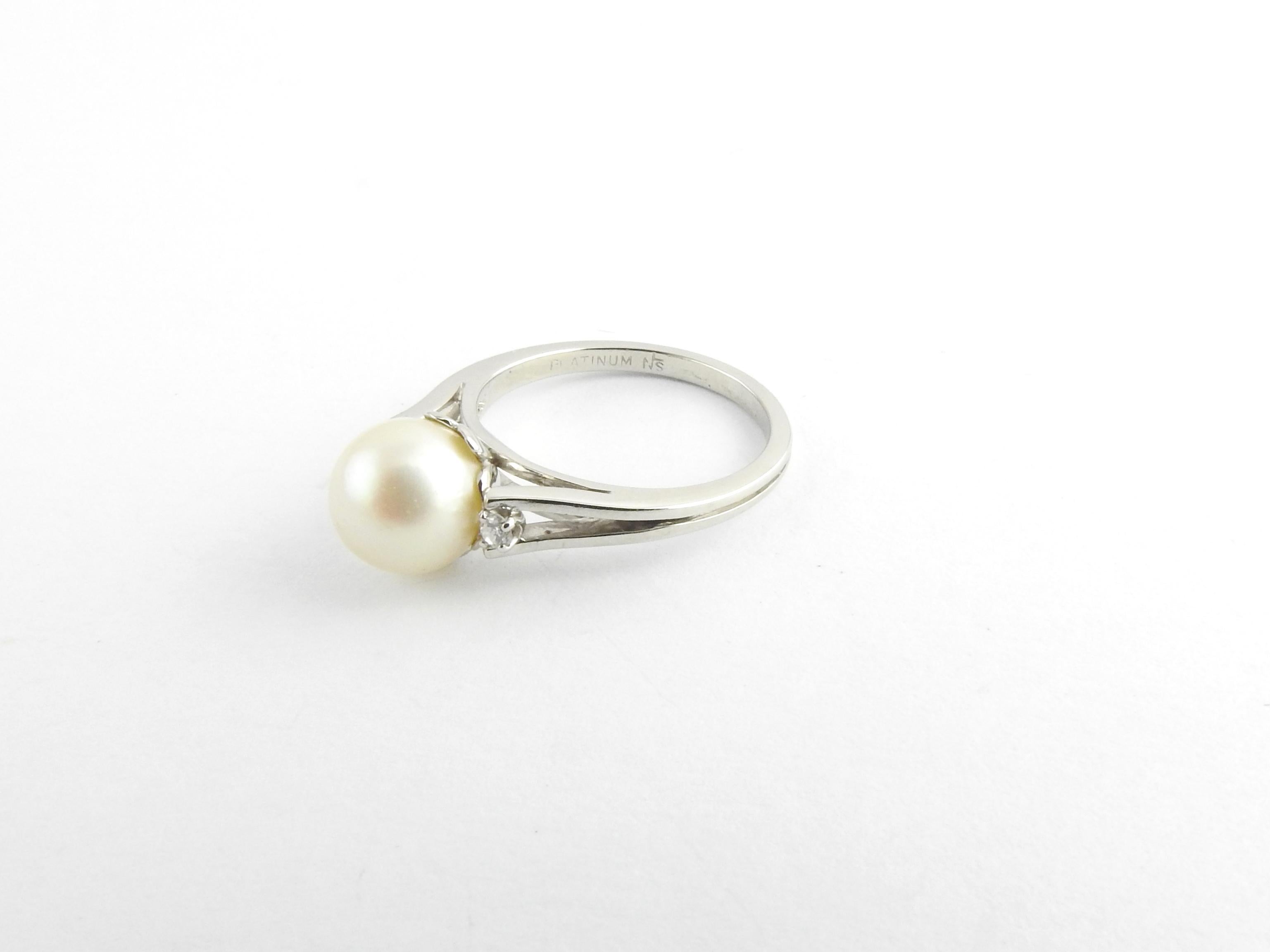 Vintage Platinum Pearl and Diamond Ring Size 5.5

This elegant ring features on cultured pearl 8 mm and two round brilliant cut diamonds set in classic platinum. Shank: 2 mm.

Approximate total diamond weight: .04 ct.

Diamond color: G

Diamond