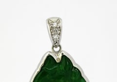Platinum Pendant with Natural Jade Carving of a Horses Head and Diamonds