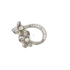 Broche de platino con diamantes redondos y en forma de baguette de 8,05 quilates, O VS1/VS2 GIA