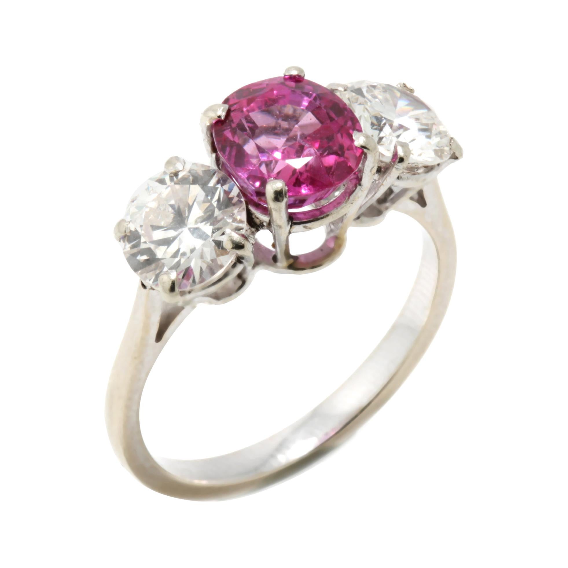 Platinum Pink Sapphire Ring of 1.50 Cts and Diamonds Totaling 2 Carats For Sale