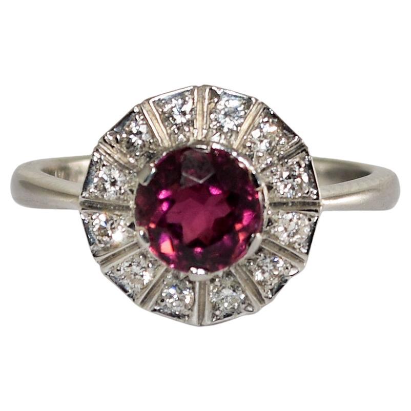 Anillo Halo de Turmalina Rosa y Diamante en Platino