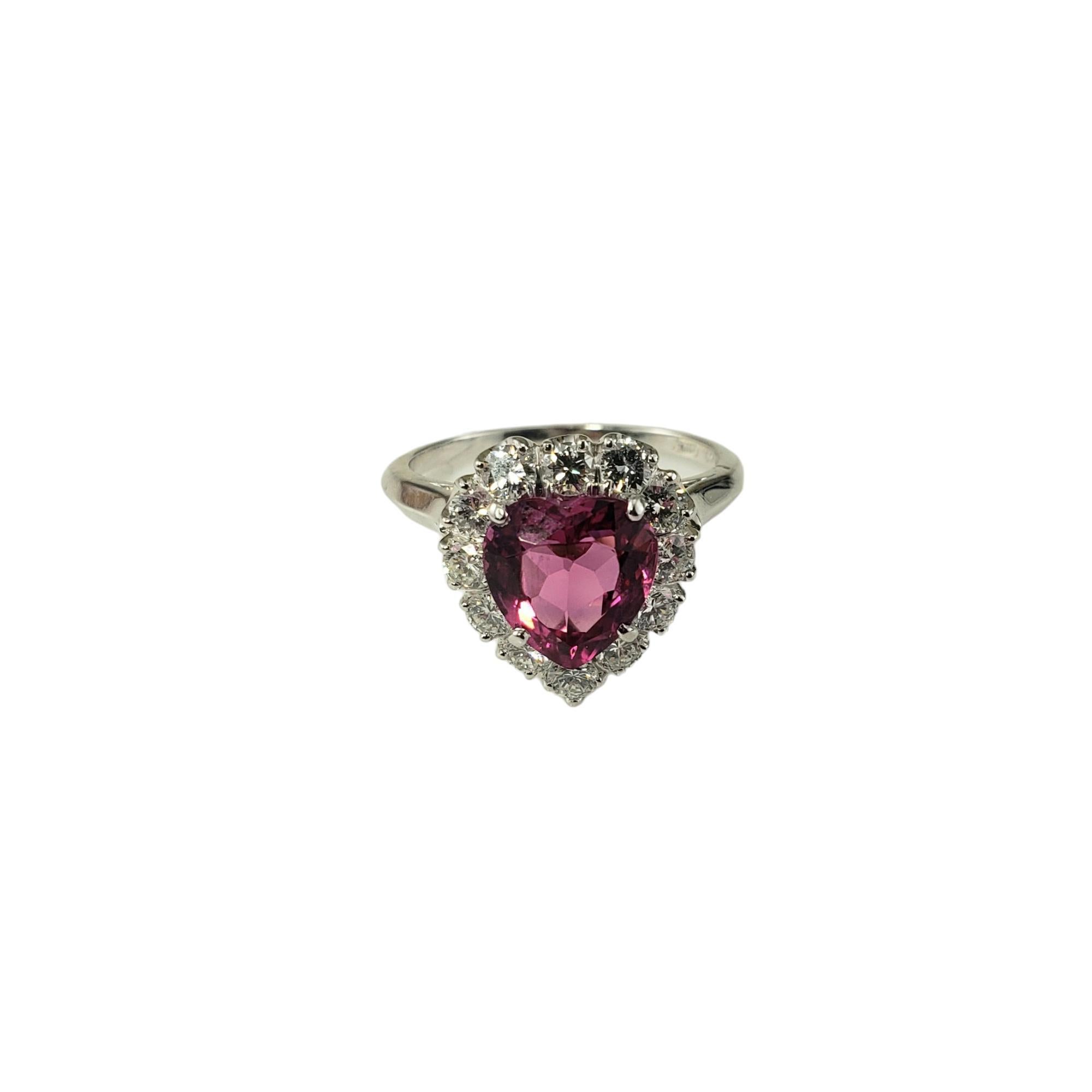 Platinum Pink Tourmaline and Diamond Ring Size 5.75 JAGi Certified-

This stunning ring features one hearth shaped natural pink tourmaline (8.5 mm x 8.0 mm) surrounded by 12 round brilliant cut diamonds set in classic platinum.

Tourmaline weight: 